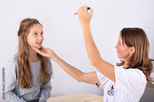 Doctor Examining Patient's Eye