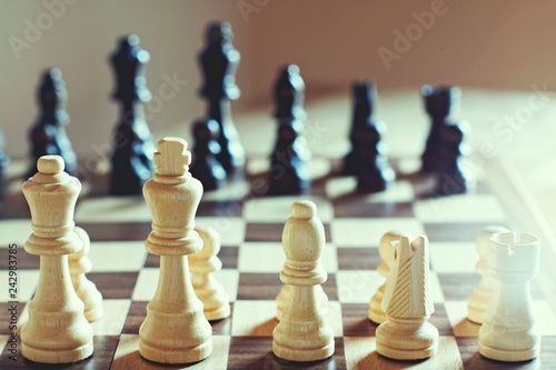 Chess board game, encounter difficult situation, business competitive concept