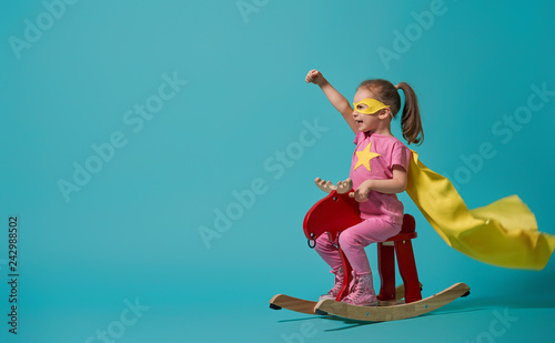 Fototapeta Naklejka Na Ścianę i Meble -  child playing superhero