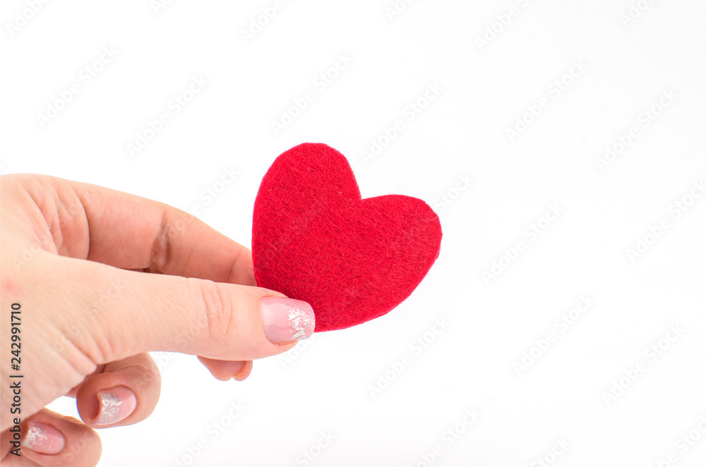 Hand made textile red heart. Isolated on white background Hand made textile red heart. Isolated on white background