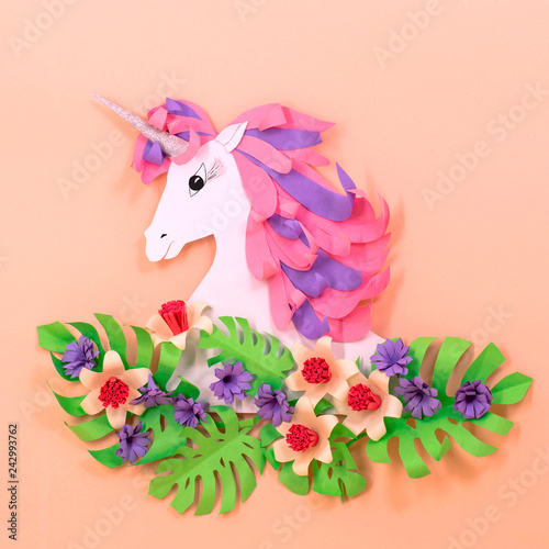 Colorful unicorn and paper flowers