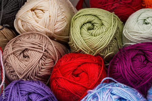 Close up of random balls of knitting wool