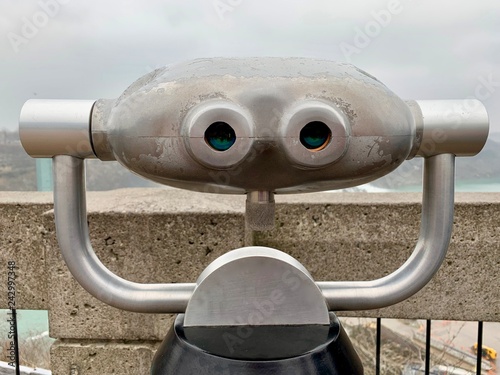 Konstfotografi Close up of binoculars that looks like a human face with eyes and a mouth