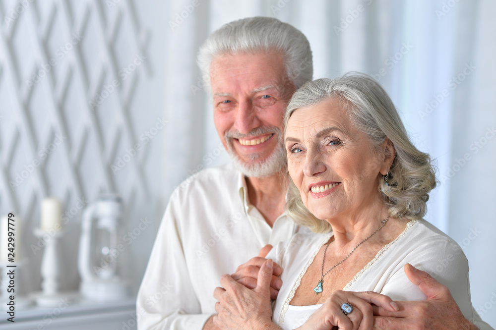 Portrait of cute senior couple posing at home Portrait of cute senior couple posing at home