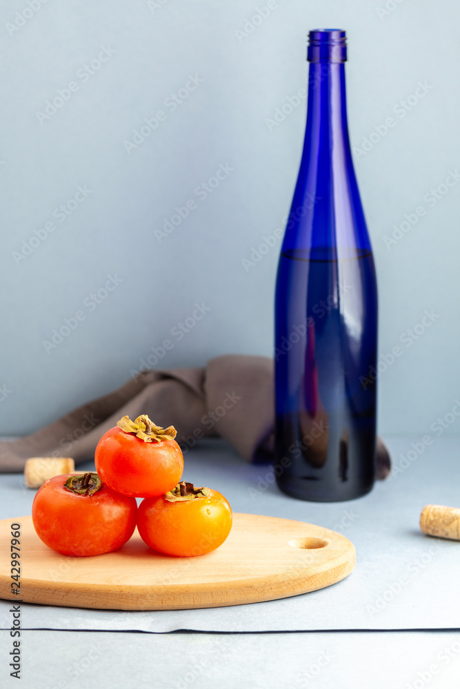 ripe juicy fragrant fruit persimmon and wine ripe juicy fragrant fruit persimmon and wine