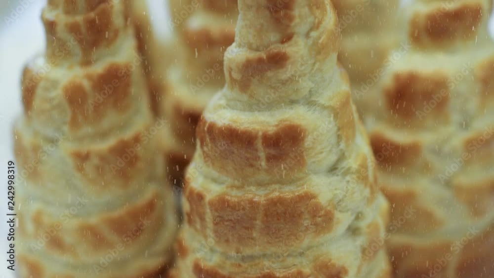 freshly baked croissants with icing sugar like Christmas trees in the winter forest freshly baked croissants with icing sugar like Christmas trees in the winter forest