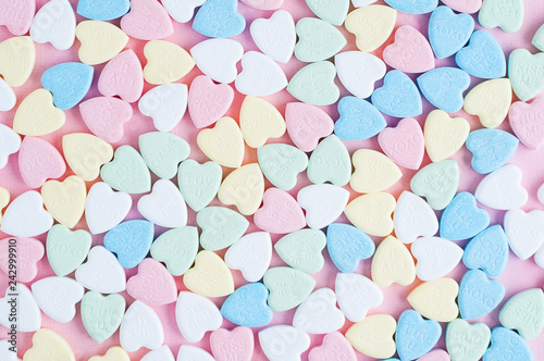 top down view of a bunch of valentine candy hearts