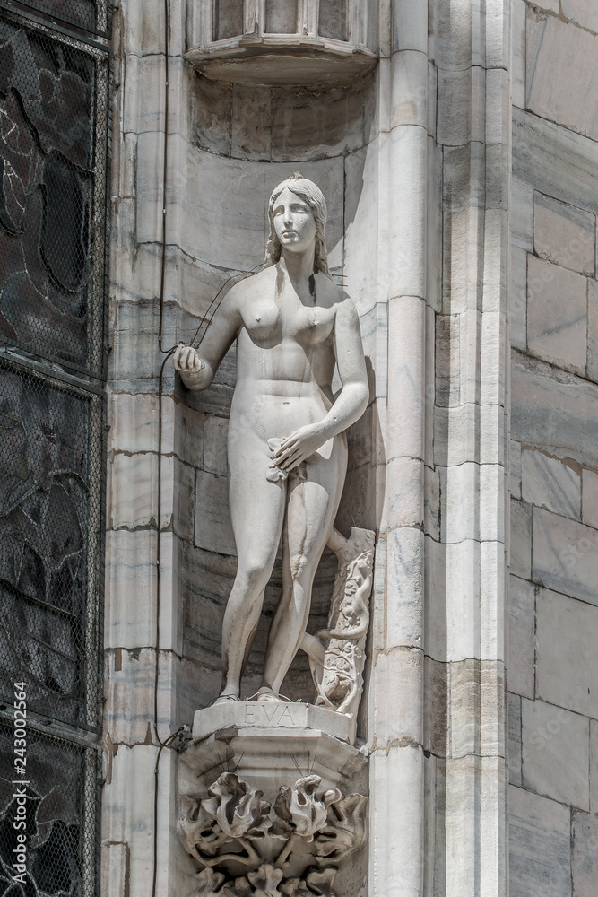 Obraz premium Beautiful statue of Eva at facade of the Cathedral of Milano, Milan, Italy, summer time, details