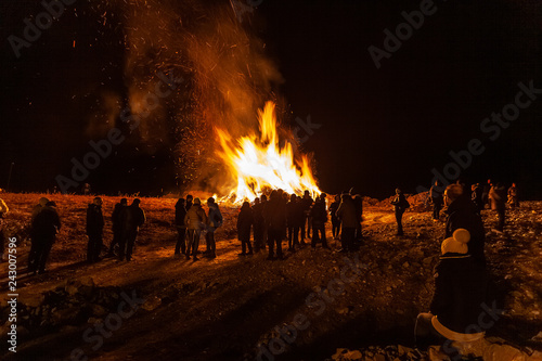 VITTORIO VENETO, ITALY - JANUARY 05 2019: People who attend the traditional bonfire of the epiphany
