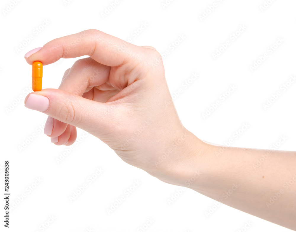 Pill capsule orange in hand medicine health on white background isolation Pill capsule orange in hand medicine health on white background isolation
