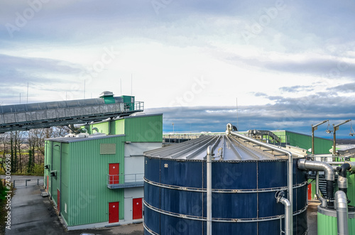 Aerial view of biogas power plant. Wastes recycling ecology concept. Green economics. Copy space.