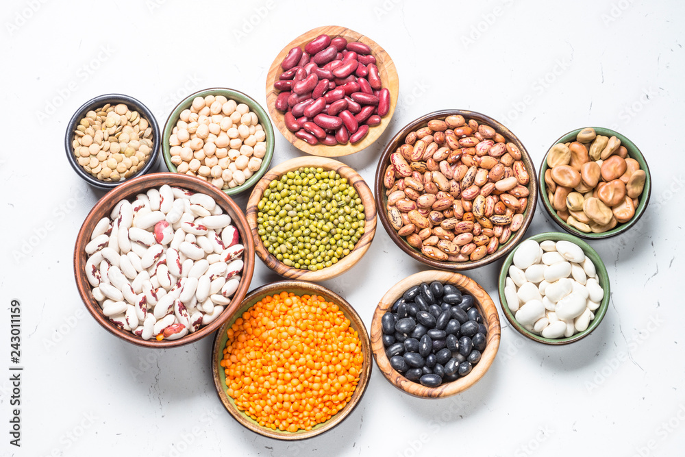 Legumes, lentils, chikpea and beans assortment on white. Legumes, lentils, chikpea and beans assortment on white.