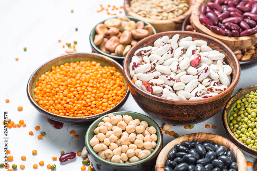 Legumes, lentils, chikpea and beans assortment on white. Legumes, lentils, chikpea and beans assortment on white.
