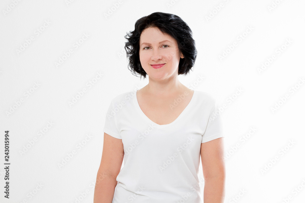 Happy middle age woman in summer blank template t shirt isolated on white background. Copy space. Happy middle age woman in summer blank template t shirt isolated on white background. Copy space.