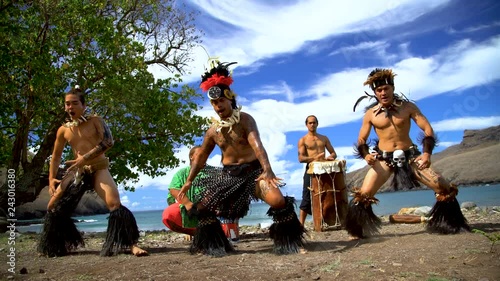 Nuku Hiva native dancers performing on beach Marquesas photo