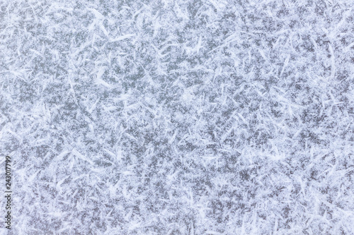 Abstract background, texture of snowflakes on ice