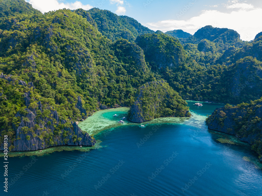 Aerial view of beautiful Twin lagoon and limestone cliffs on Coron island, Palawan, Philippines.