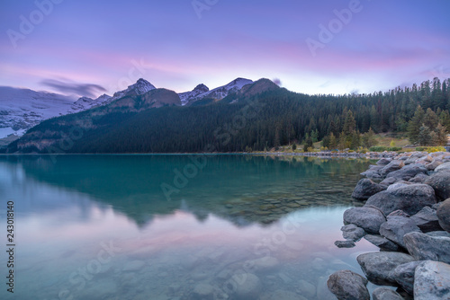 Long exposure photography of purple blue sky during dusk at Lake Louise , Alberat, Canada
