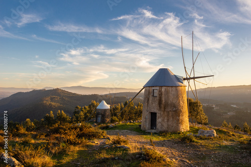 Landscape of Windmills in Penacova Portugal (Moinhos de Gavinhos) with Mountains at Sunset