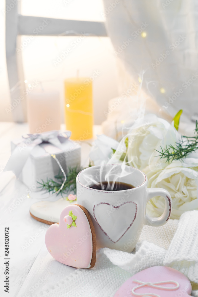 Heart cookies with cup of coffee on wooden background with plaid, copy space Heart cookies with cup of coffee on wooden background with plaid, copy space