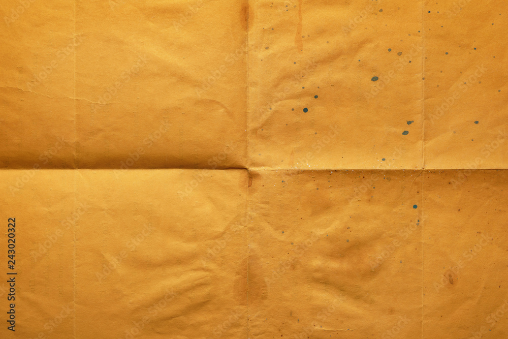 Empty orange notepaper folded in four Empty orange notepaper folded in four