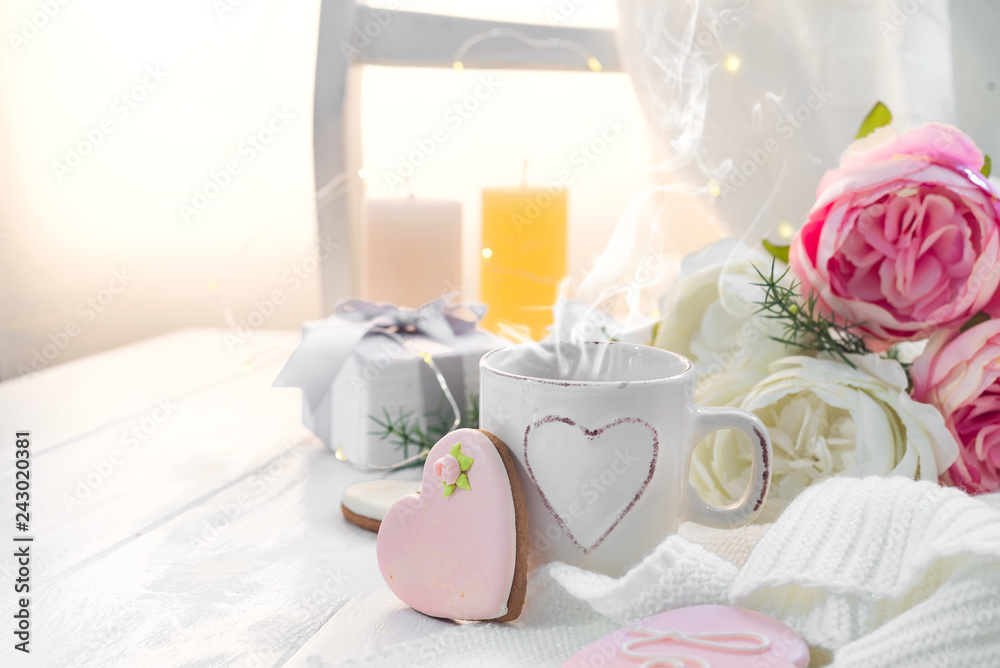 Heart cookies with cup of coffee on wooden background with plaid, copy space Heart cookies with cup of coffee on wooden background with plaid, copy space