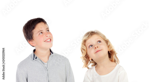 Two children looking up