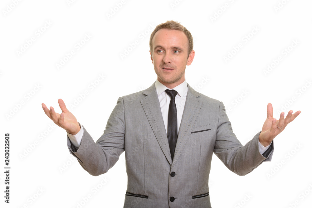 Handsome Caucasian businessman giving speech isolated against white background Handsome Caucasian businessman giving speech isolated against white background