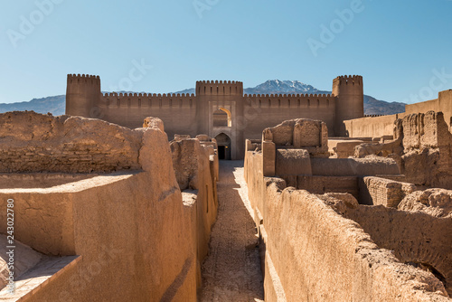 Frontal view of an adobe castle Rayen close to the town Kerman under mountain Haraz, Iran