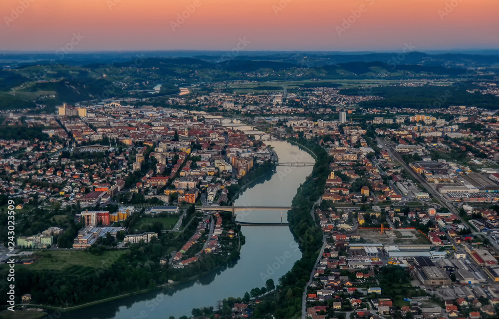 Aerial view of european city with river and bridges at sunset, Maribor, Slovenia