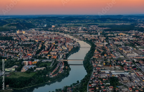 Aerial view of european city with river and bridges at sunset, Maribor, Slovenia