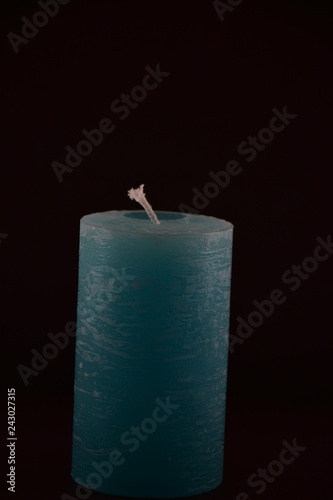 candle on black background photo