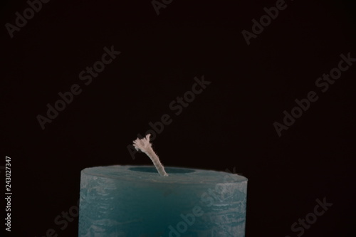 candle on black background photo