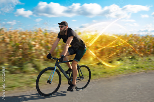 Young cyclist riding bicycle with magical landscape and concept