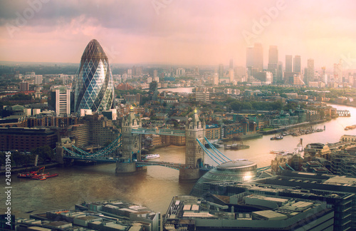 Fototapeta London view at sunset. Panorama include river Thames, Tower bridge and City of London and Canary Wharf  buildings.