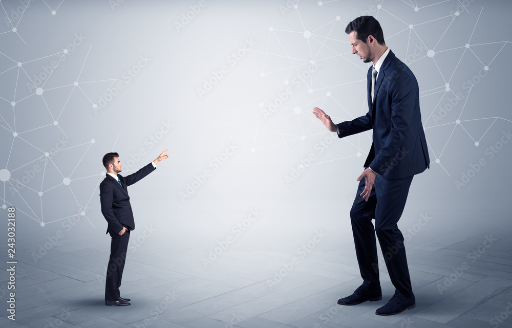 Small businessman aiming at a big businessman with connection and network concept
Small businessman aiming at a big businessman with connection and network concept
