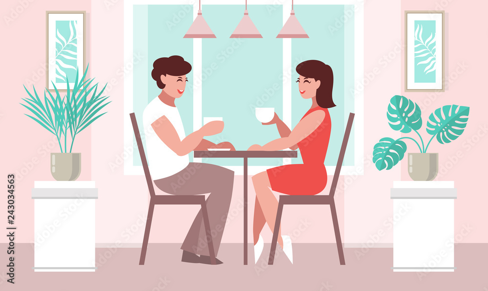 Lovers woman and a man at a table in a cafe. 