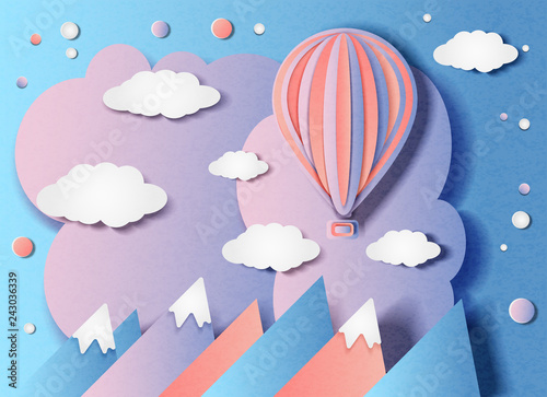 Vector illustration of a balloon flying over the mountains in minimal style. Paper cut
