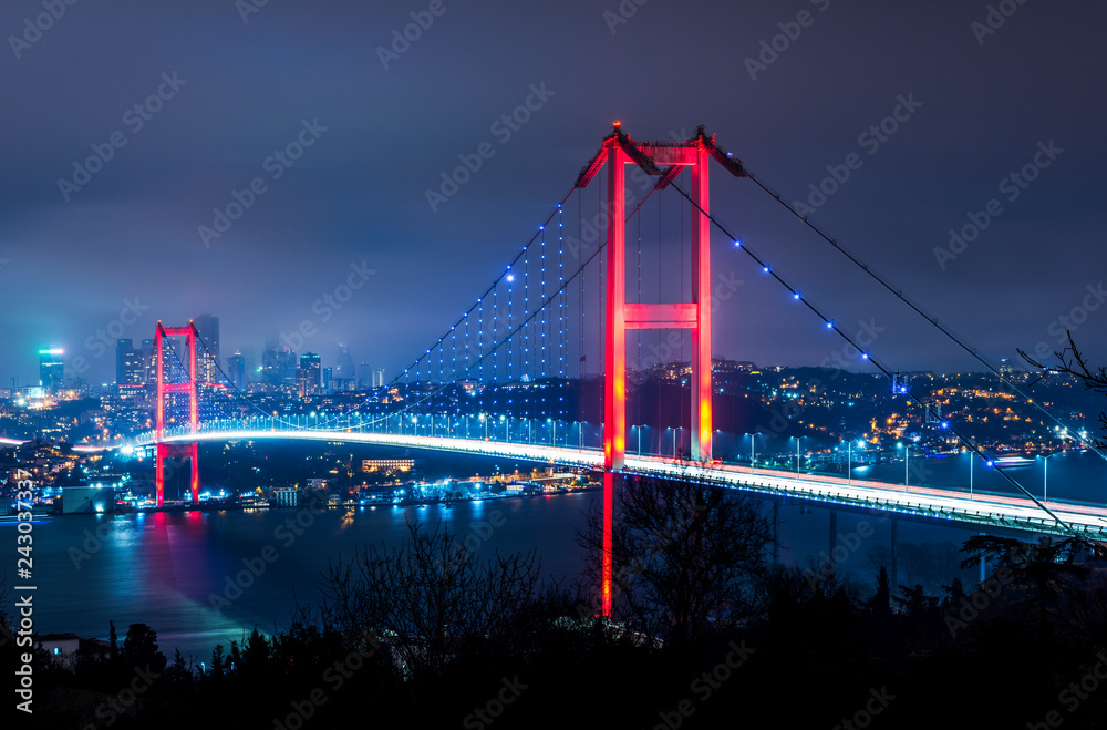 Istanbul Bosphorus Bridge at night. 15th July Martyrs Bridge (15 Temmuz Sehitler Koprusu). Istanbul, Turkey..