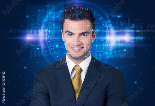 Facial recognition system. Young man on blue background