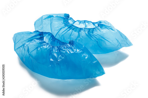 Wallpaper Mural Two blue medical Shoe covers for feet isolated on white background. Hygiene and cleanliness in health facilities Torontodigital.ca