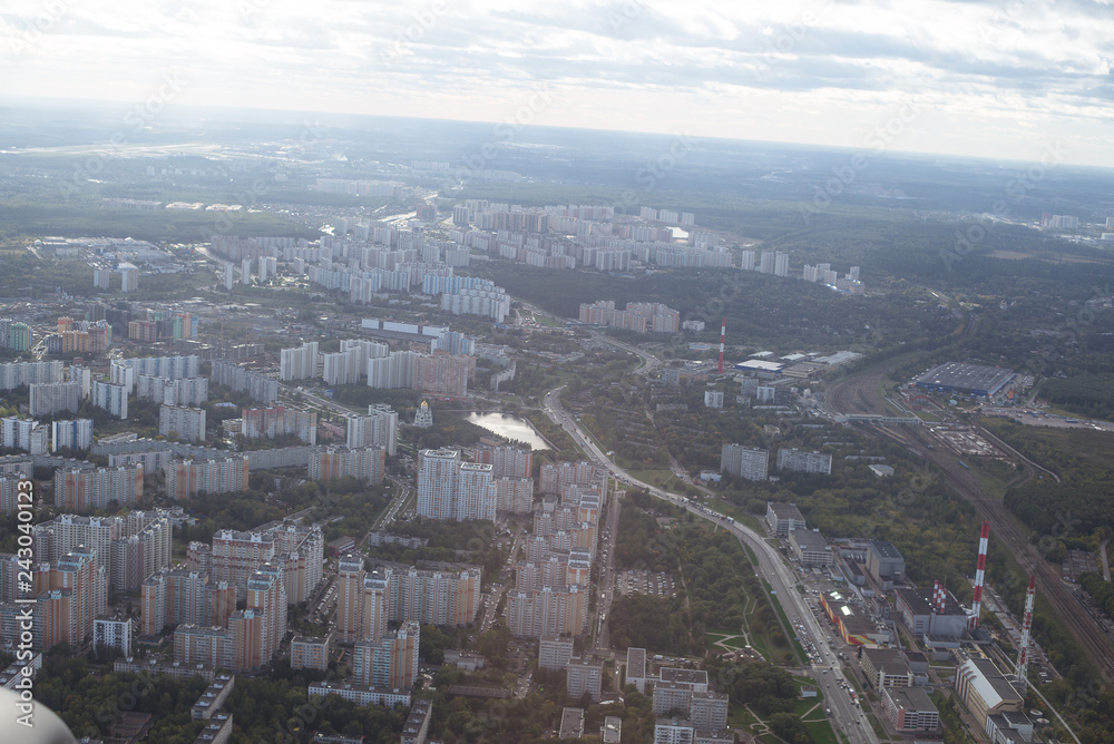 view from the plane to the Moscow region, top view of the city