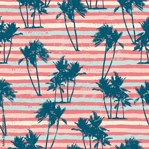 Seamless exotic pattern with tropical plants and stripes background.