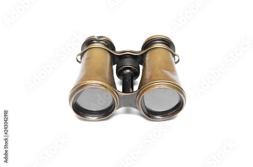 Vintage binoculars isolated on the white background.