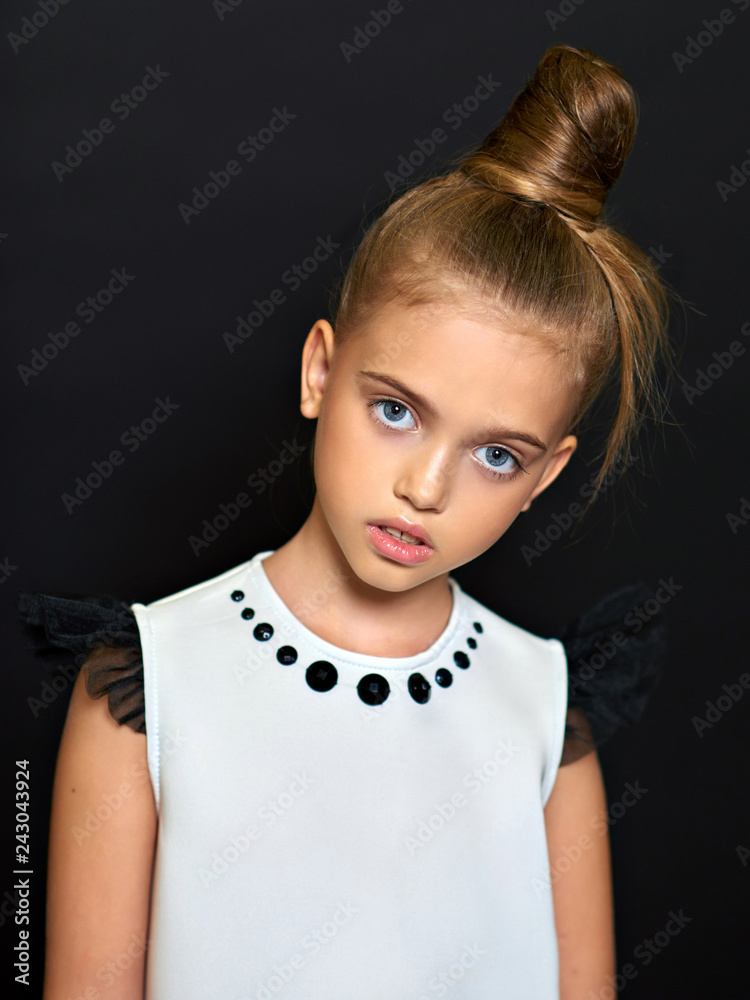 beautiful girl on black background looking at you beautiful girl on black background looking at you