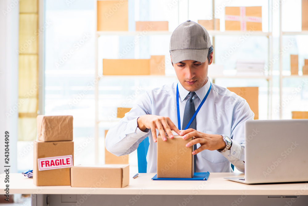 Male employee working in box delivery relocation service Male employee working in box delivery relocation service