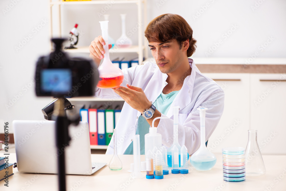 Chemist blogger recording video for his blog Chemist blogger recording video for his blog