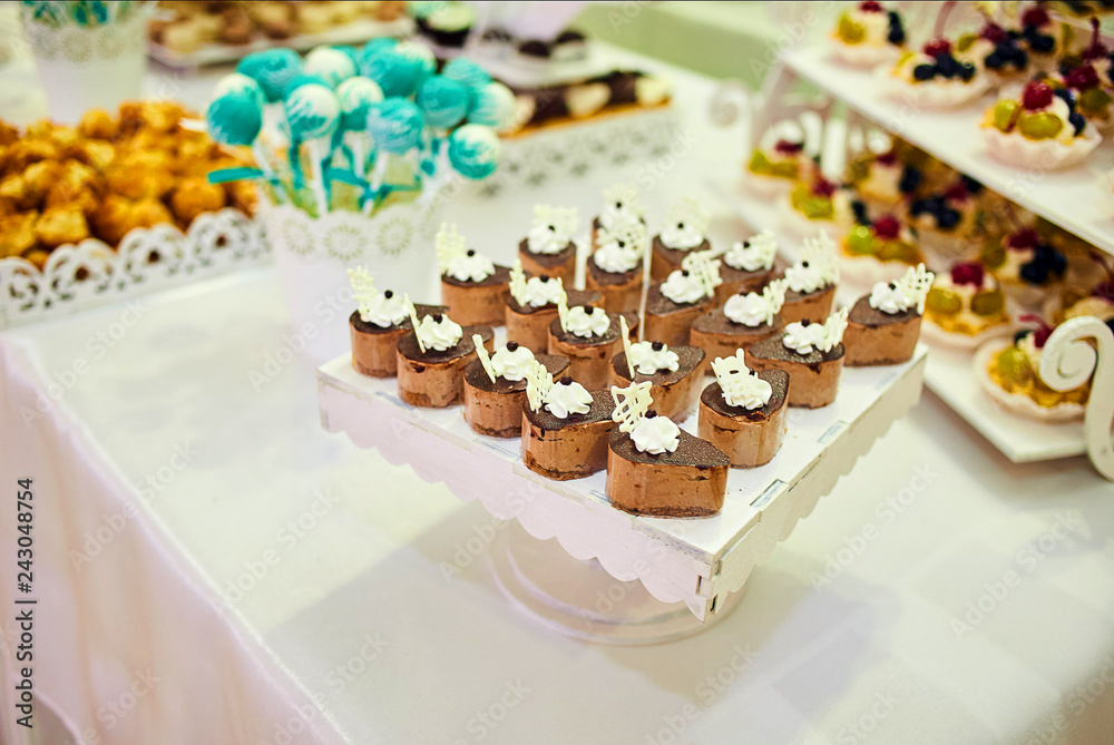 candy bar decorated by delicious sweet buffet with cupcakes and other desserts/candies,happy birthday concept candy bar decorated by delicious sweet buffet with cupcakes and other desserts/candies,happy birthday concept