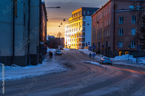 Canvas-taulu Sunset in the city view at winter time