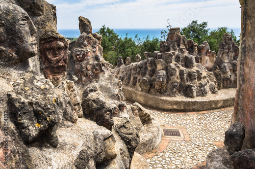 Heads engraved on the rocks at Castello Incantato (Enchanted Castle), a spectacular outdoor artwork constructed by Filippo Bentivegna near Sciacca, Sicily, Italy